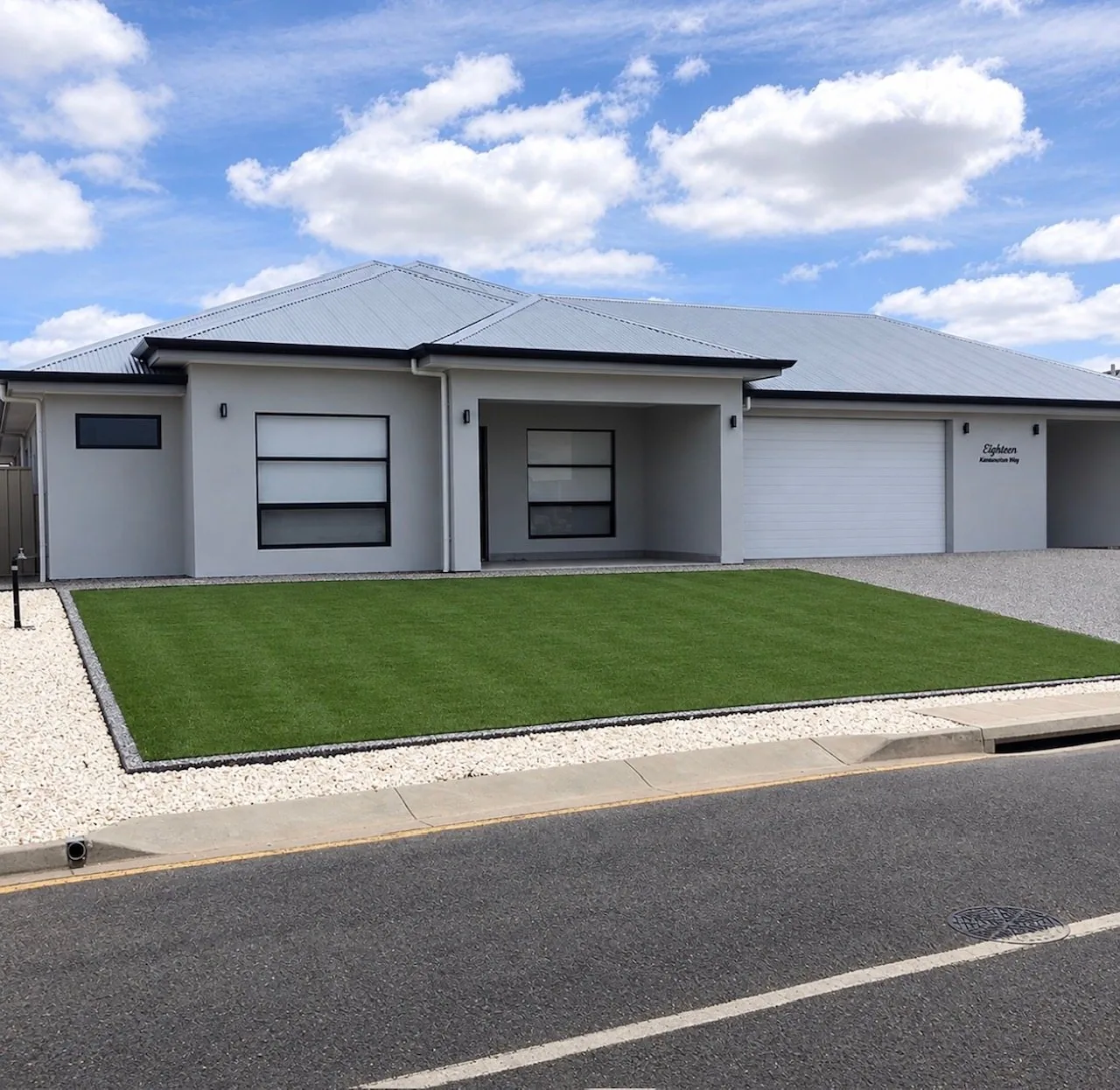 New home built in Adelaide with rendered facade, double garage and landscaping