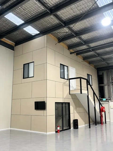 Warehouse fit out in Adelaide, two storey mezzanine office with steel stair
