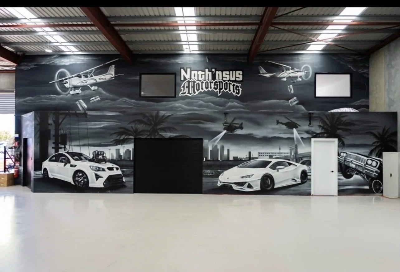 Warehouse fit outs, Adelaide: showroom floor with feature wall and polished concrete